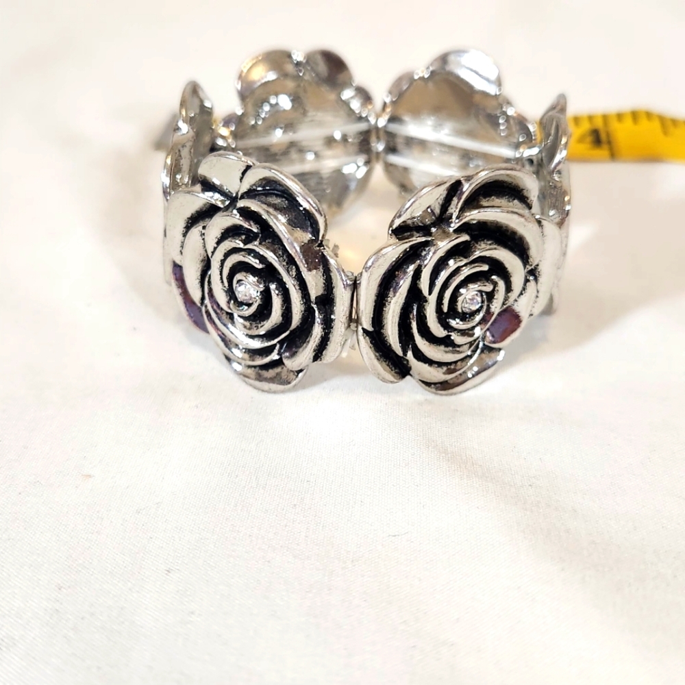 Silver Rose and Rhinestone stretchy bracelet. Unknow brand